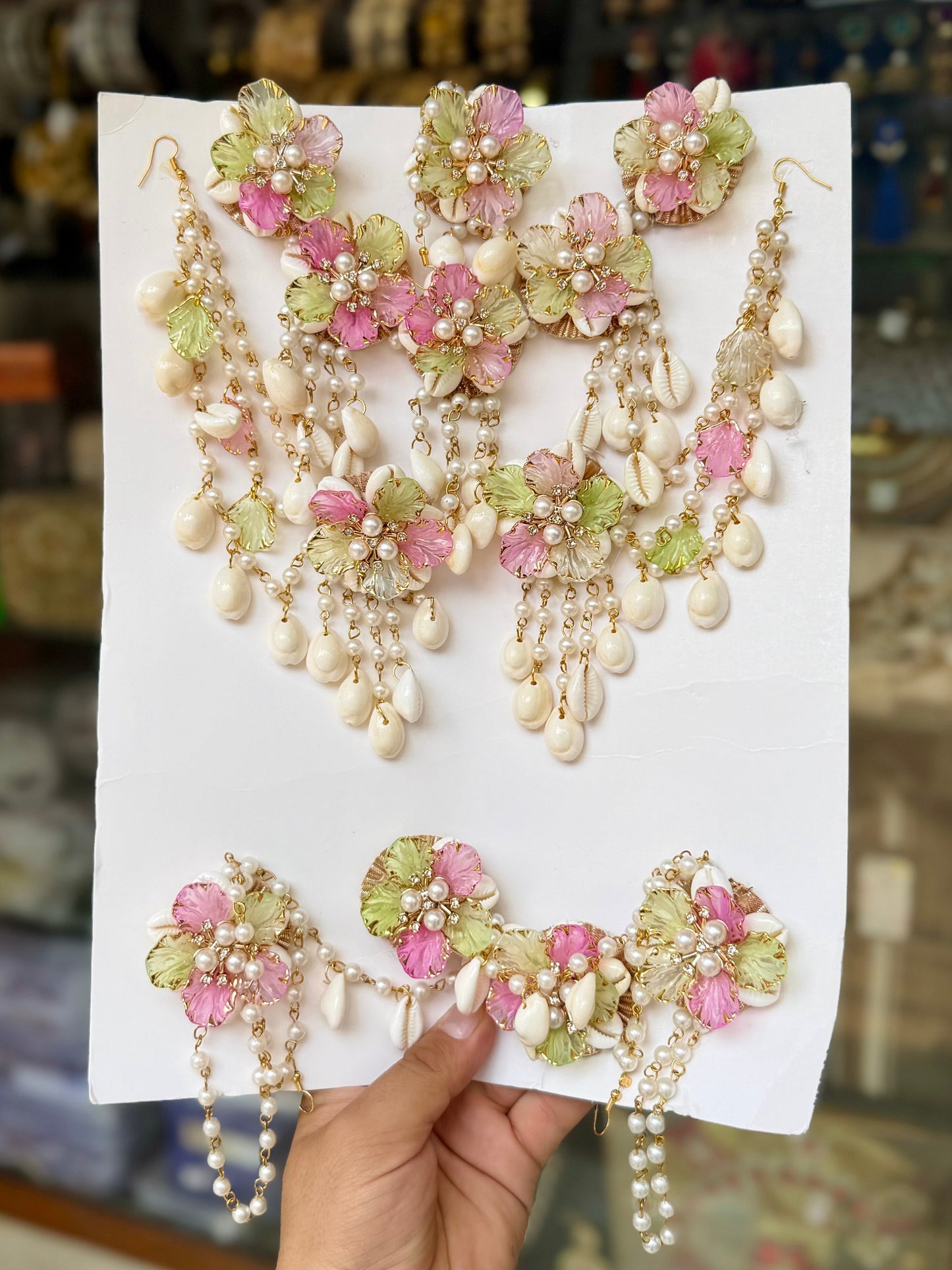 Ethereal Blooms & Coastal Harmony: Light Pink, Pista, and Pearl Floral with Hand-picked Cowrie Shells Jewellery Set.